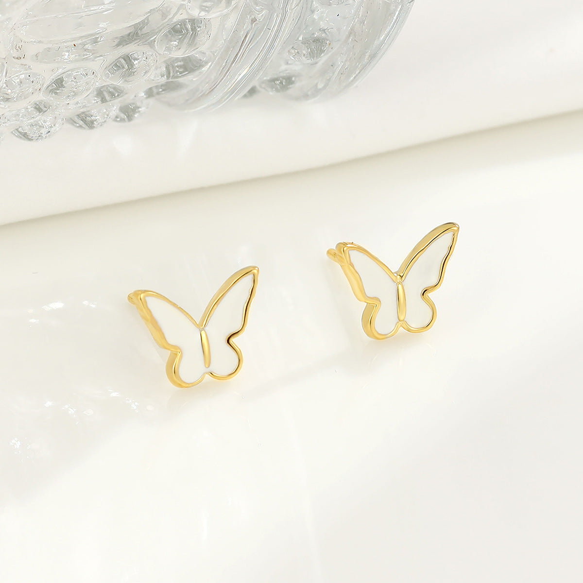 Wholesale S925 Drop Glazed White Butterfly Sterling Silver Earrings